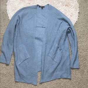 Light blue cardigan sweater